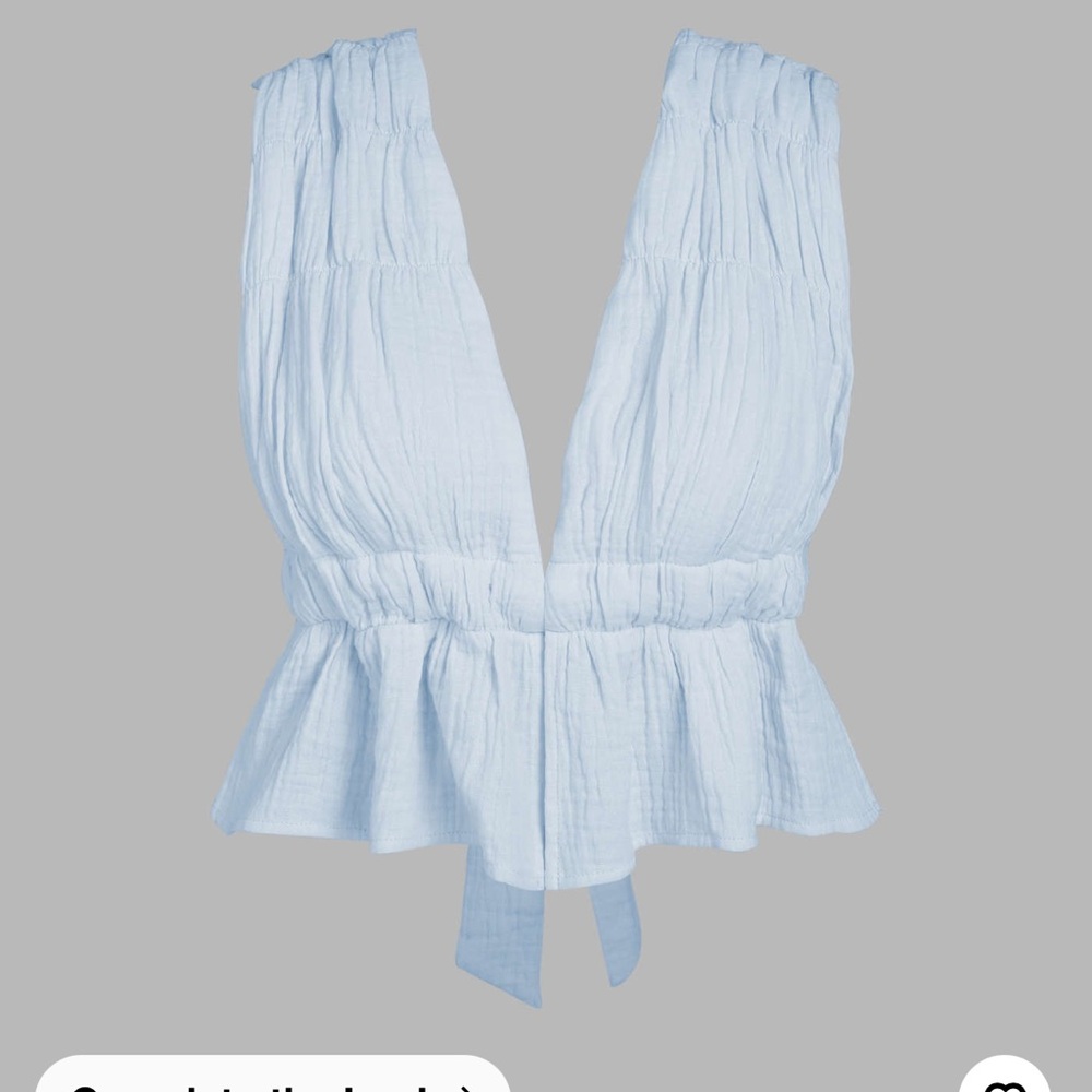 Light Blue Sleeveless Peplum Top